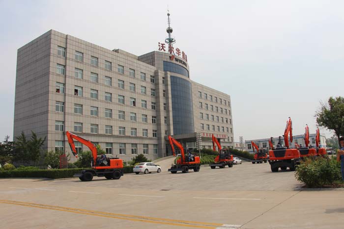 热烈祝贺沃尔华集团 60台轮式挖掘机批量出口泰国 热烈祝贺沃尔华集团 60台轮式挖掘机批量出口泰国