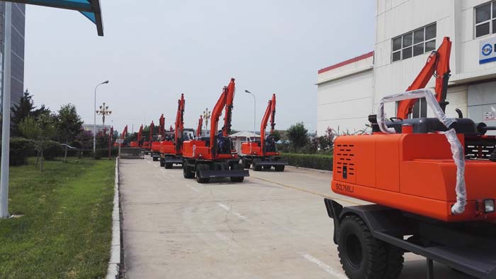 热烈祝贺沃尔华集团 60台轮式挖掘机批量出口泰国 热烈祝贺沃尔华集团 60台轮式挖掘机批量出口泰国